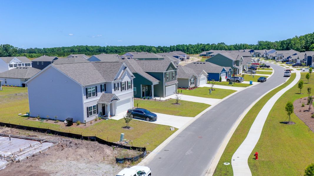 Aerial view of the Vineyard Trail community in Jacksonville, NC, showing layout and nearby surroundings (Image 15). Aerial view of the Vineyard Trail community in Jacksonville, NC, showing layout and nearby surroundings (Image 15).