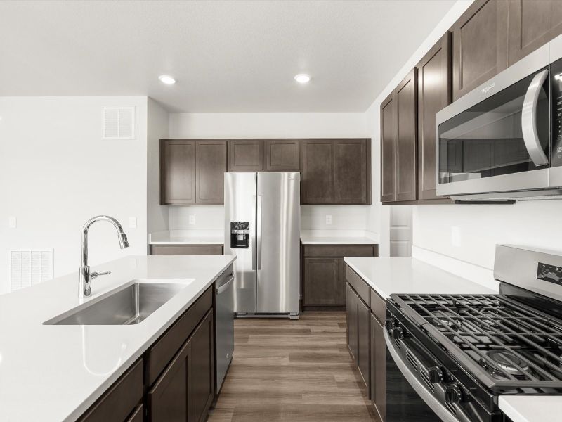 Furnished interior in a model home at Frontier Estates - The Flora Collection in Firestone (Image 15).