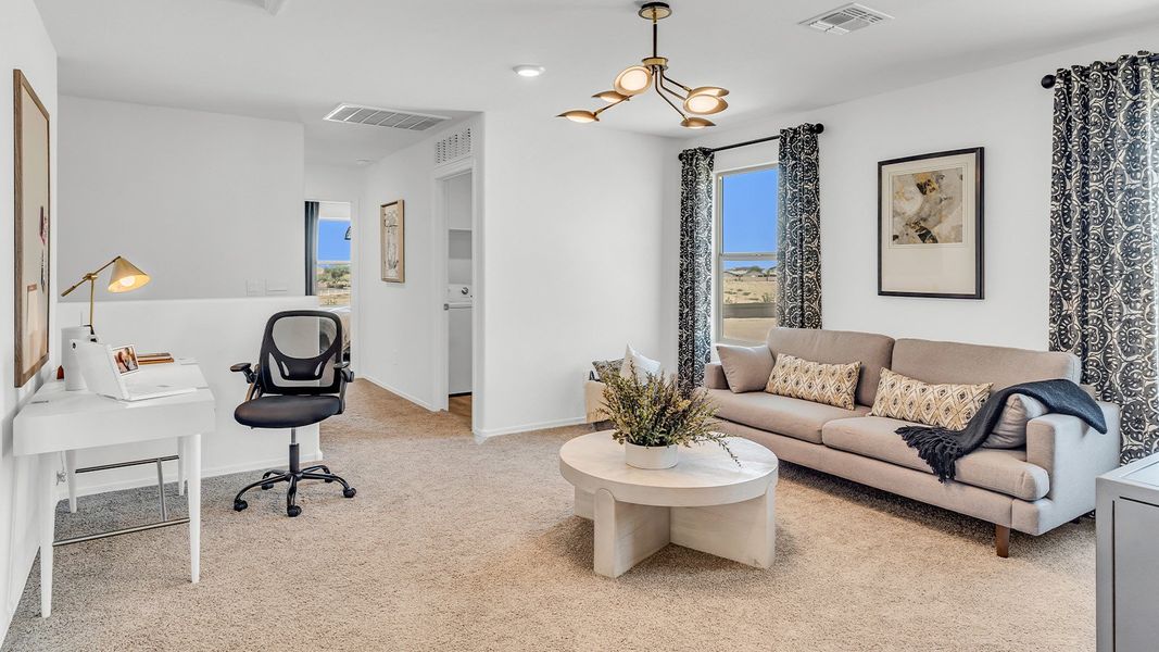 Furnished interior in a model home at Coronet at Gladden Farms in Marana (Image 62).