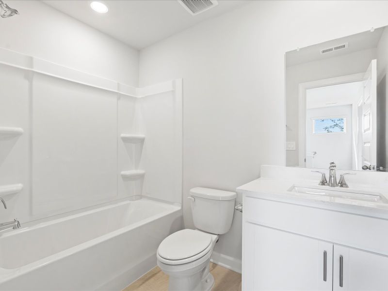 Furnished interior in a model home at Brayfield Manor - Signature Collection in Wellford (Image 7).