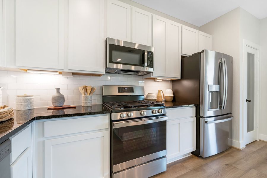 Furnished interior in a model home at Magnolia Springs in Montgomery (Image 27).