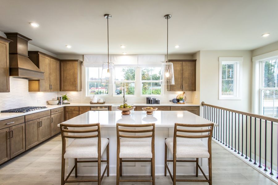 Furnished interior in a model home at Towne Village at Suwanee Dam in Sugar Hill (Image 3).