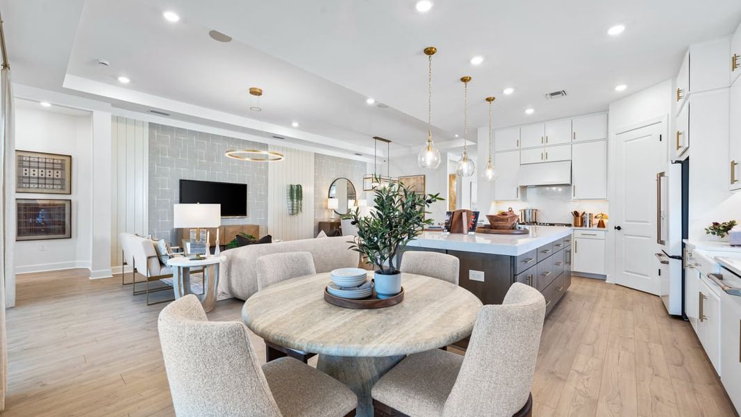 Furnished interior in a model home at Esplanade by the Islands in Naples (Image 28).