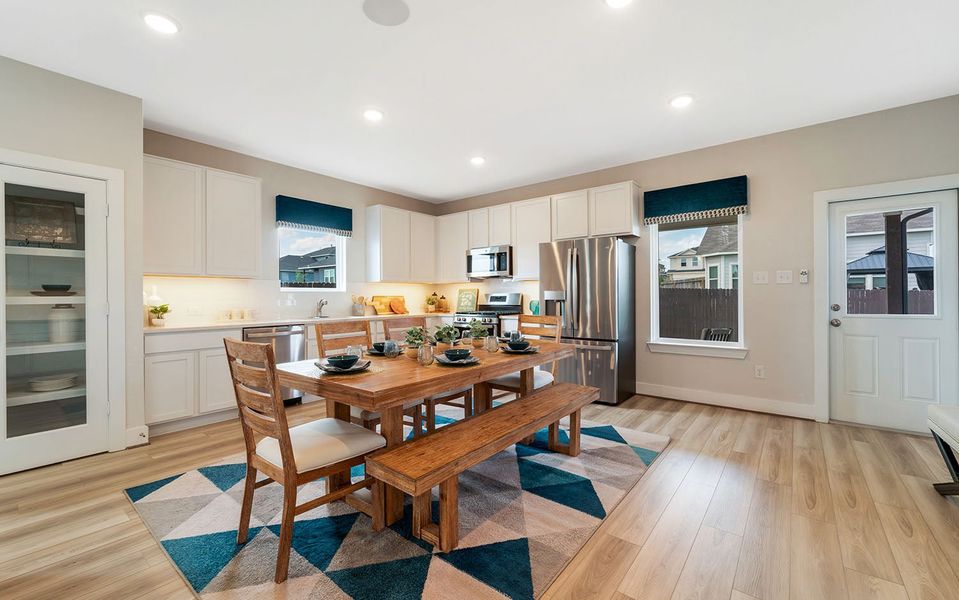 Furnished interior in a model home at Hunter's Ranch in San Antonio (Image 25).