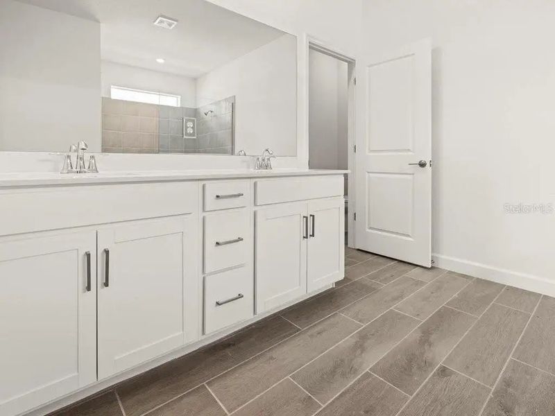 Furnished interior in a model home at Harbor East: Executive Homes in Port Charlotte (Image 6).