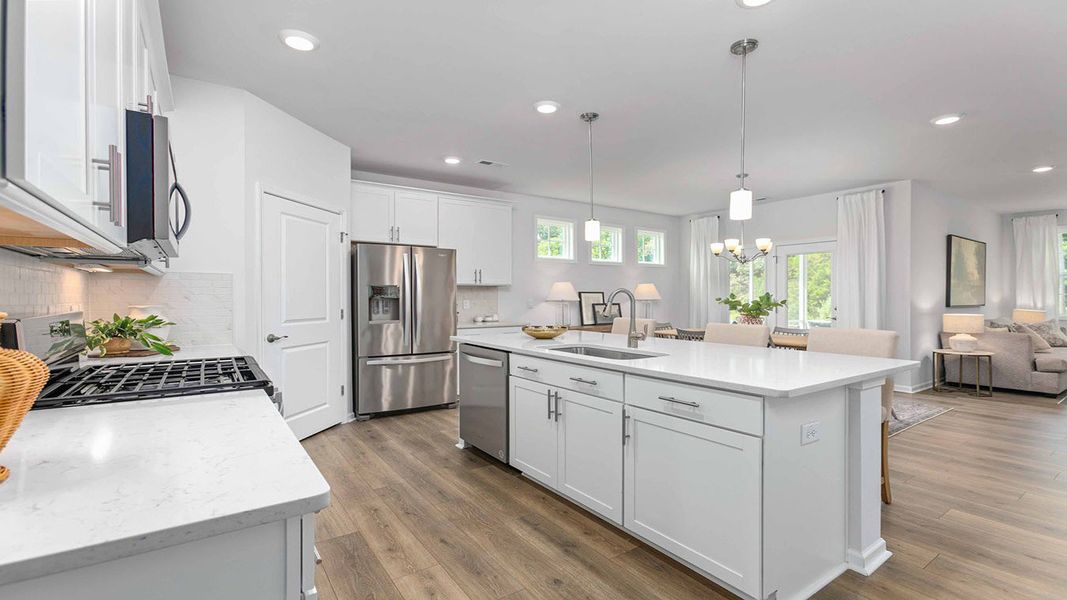 Furnished interior in a model home at The Villas at Kinsley in Jamestown (Image 13).