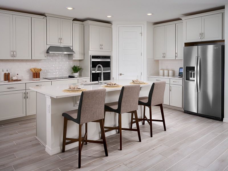 Furnished interior in a model home at Oakfield Trails - Signature Series in Parrish (Image 10).