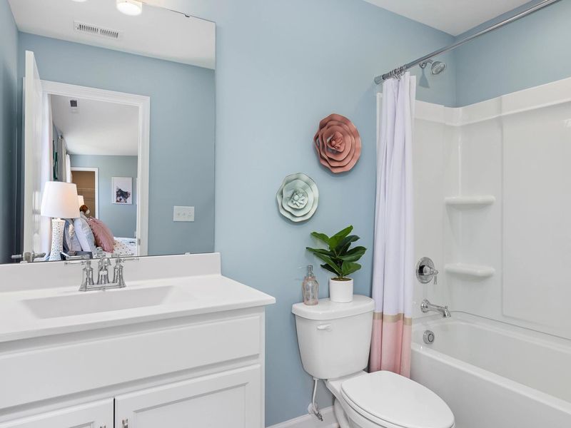 Furnished interior in a model home at Woodland Crossing in Zebulon (Image 11). Furnished interior in a model home at Woodland Crossing in Zebulon (Image 11).