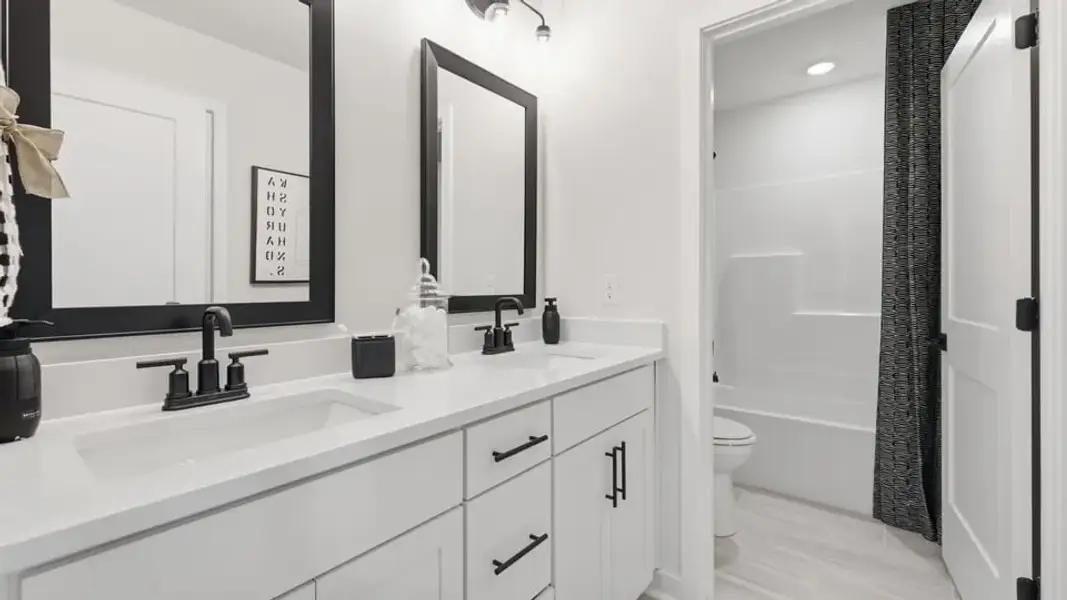 Furnished interior in a model home at Spring Ridge Reserve in Anderson (Image 31).