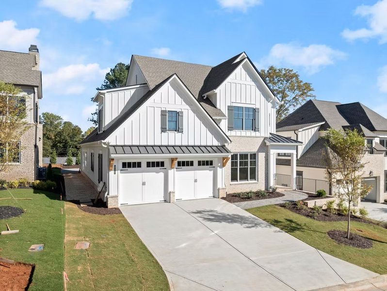 Front exterior of a home in the The Cottages at Keeler Woods community, located in Marietta, GA (Image 15).