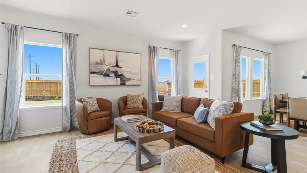 Furnished interior in a model home at Saddle Ridge Estates in Lytle (Image 5).