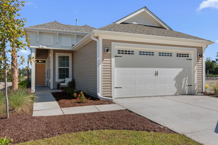 Front exterior of a home in the Coastal Club of the Carolinas community, located in Calabash, NC (Image 13).