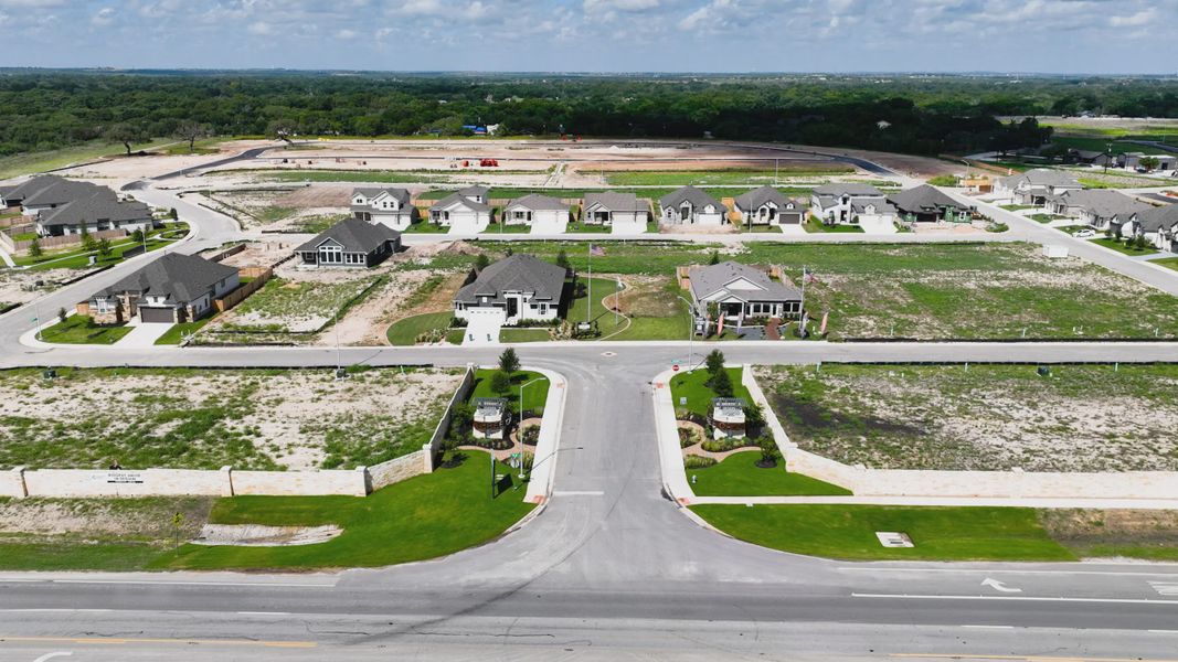 Aerial view of the Village at Three Oaks community in Seguin, TX, showing layout and nearby surroundings (Image 12). Aerial view of the Village at Three Oaks community in Seguin, TX, showing layout and nearby surroundings (Image 12).