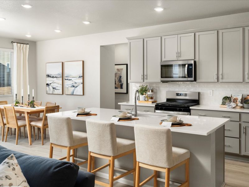 Furnished interior in a model home at Paint Brush Hills in Peyton (Image 3).