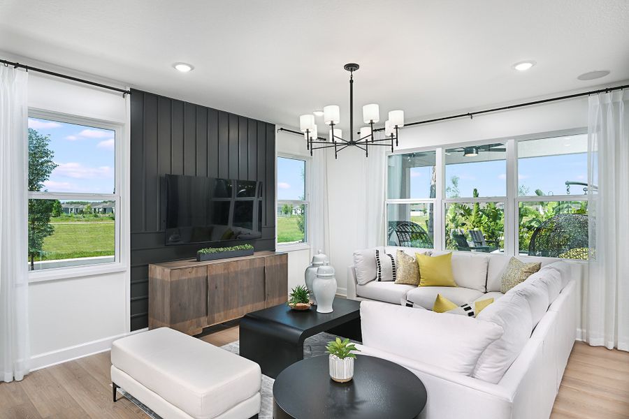 Furnished interior in a model home at Storey Creek in Kissimmee (Image 8).