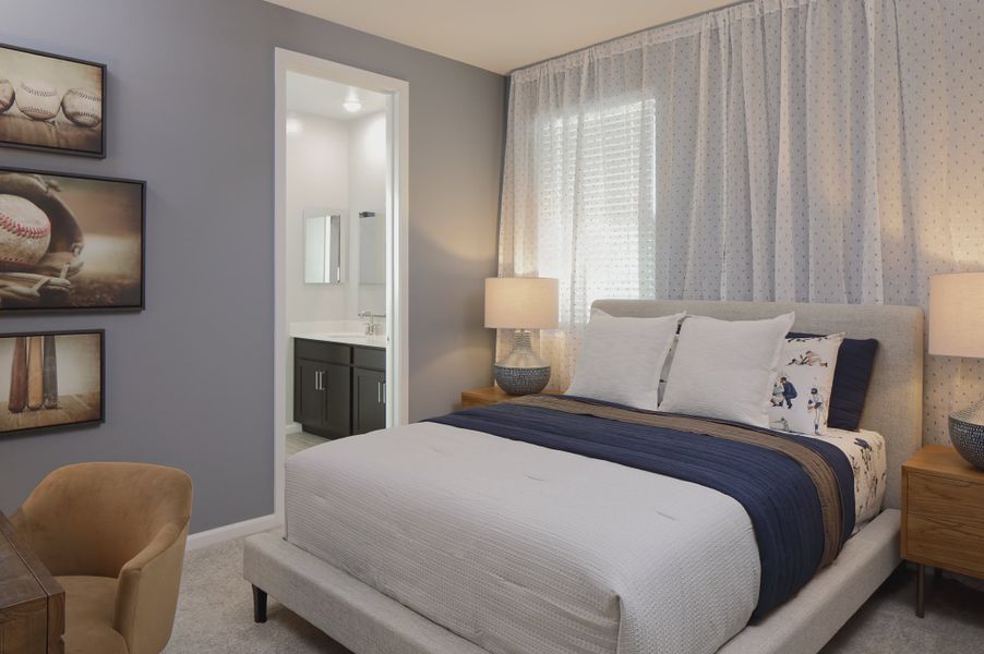 Furnished interior in a model home at Stonebridge Manor in Waddell (Image 3).