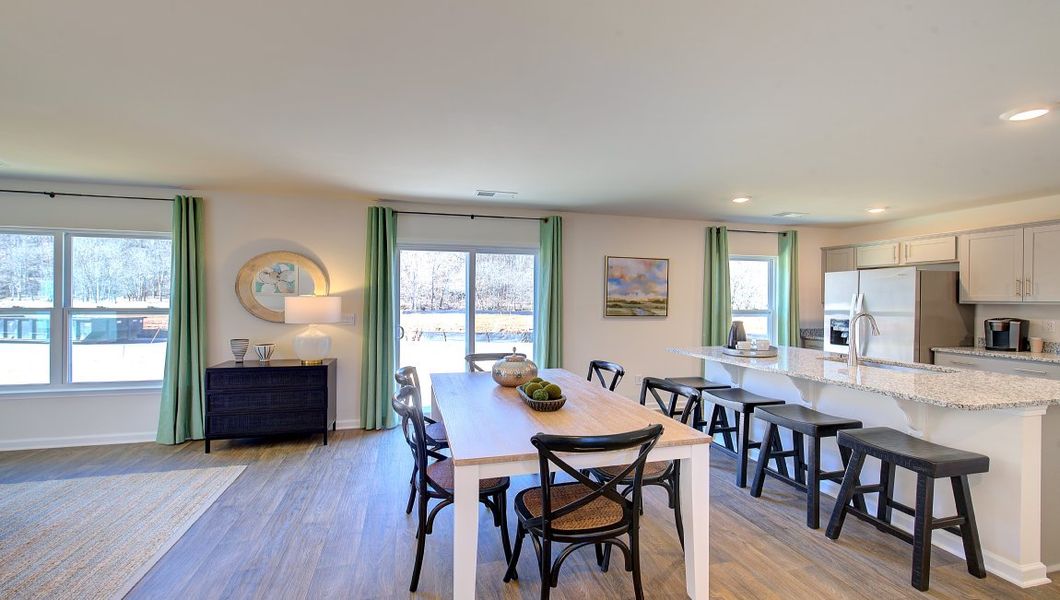 Furnished interior in a model home at Wildbrook Village in Waynesville (Image 3).