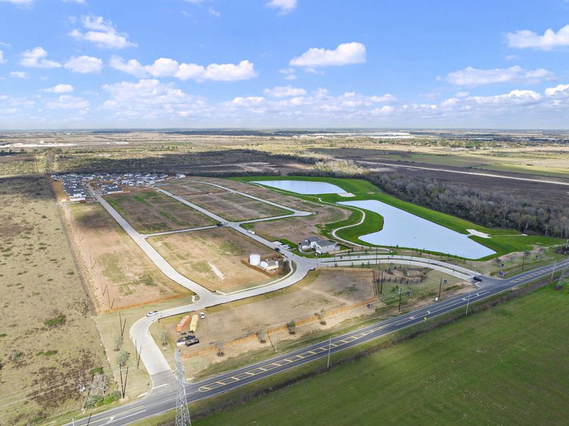 A high angle view of a road with Prairie Queen Recreation Area in the background. A high angle view of a road with Prairie Queen Recreation Area in the background.