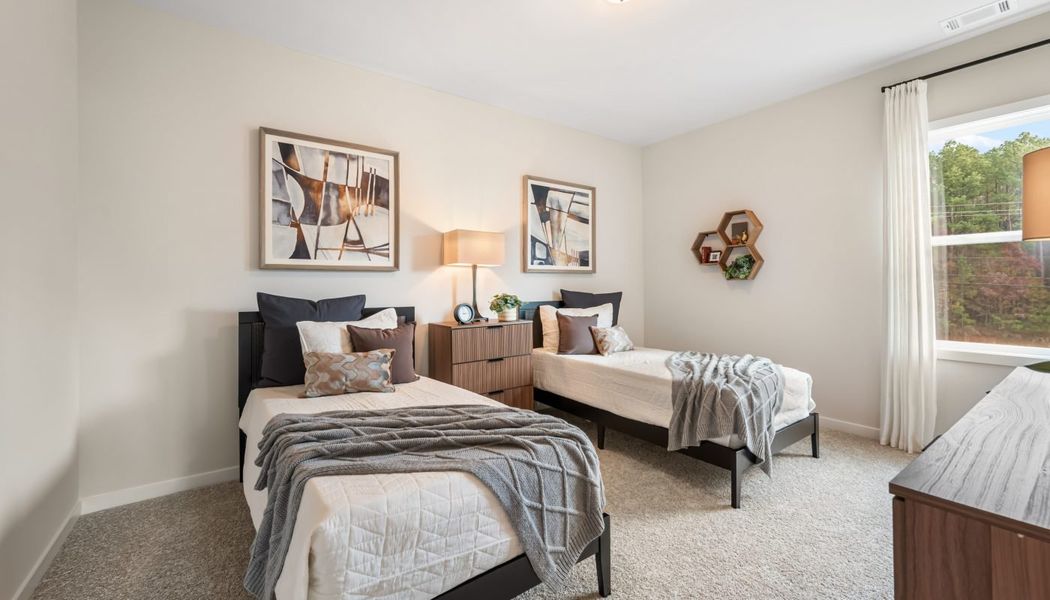 Furnished interior in a model home at Pinecrest Ridge in Dacula (Image 37).