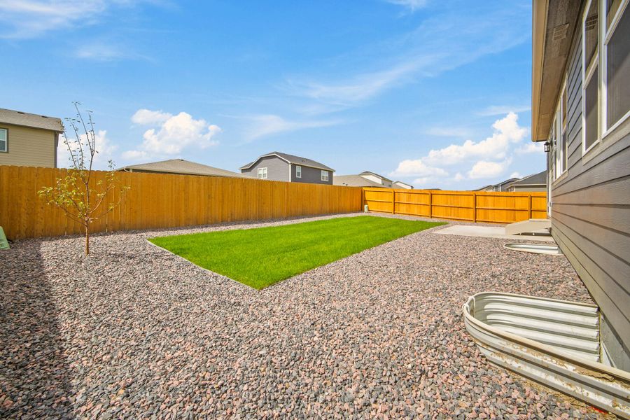Front exterior of a home in the The Glen-12 community, located in Colorado Springs, CO (Image 9).