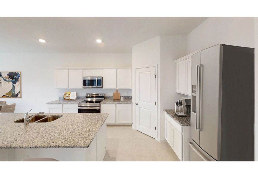 Furnished interior in a model home at Sunset Hills in Winter Haven (Image 3).