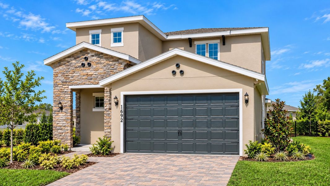 Front exterior of a home in the Hills of Minneola community, located in Minneola, FL (Image 9).