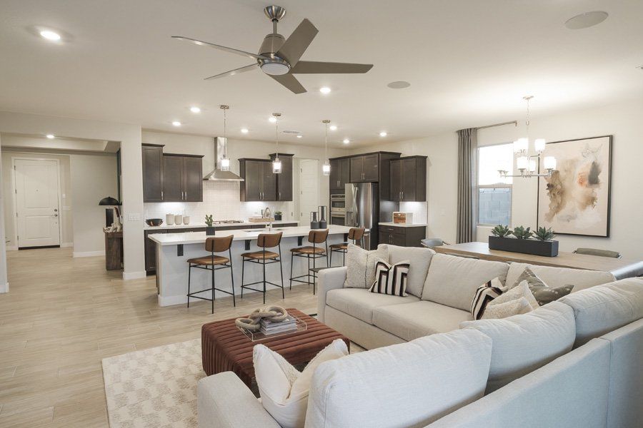 Furnished interior in a model home at Windrose V in Waddell (Image 12).