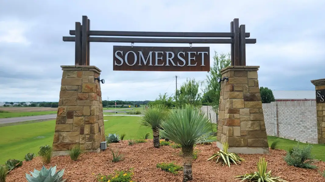 Entrance to the Somerset community in Hillsboro, TX, featuring signage and landscaping (Image 1). Entrance to the Somerset community in Hillsboro, TX, featuring signage and landscaping (Image 1).