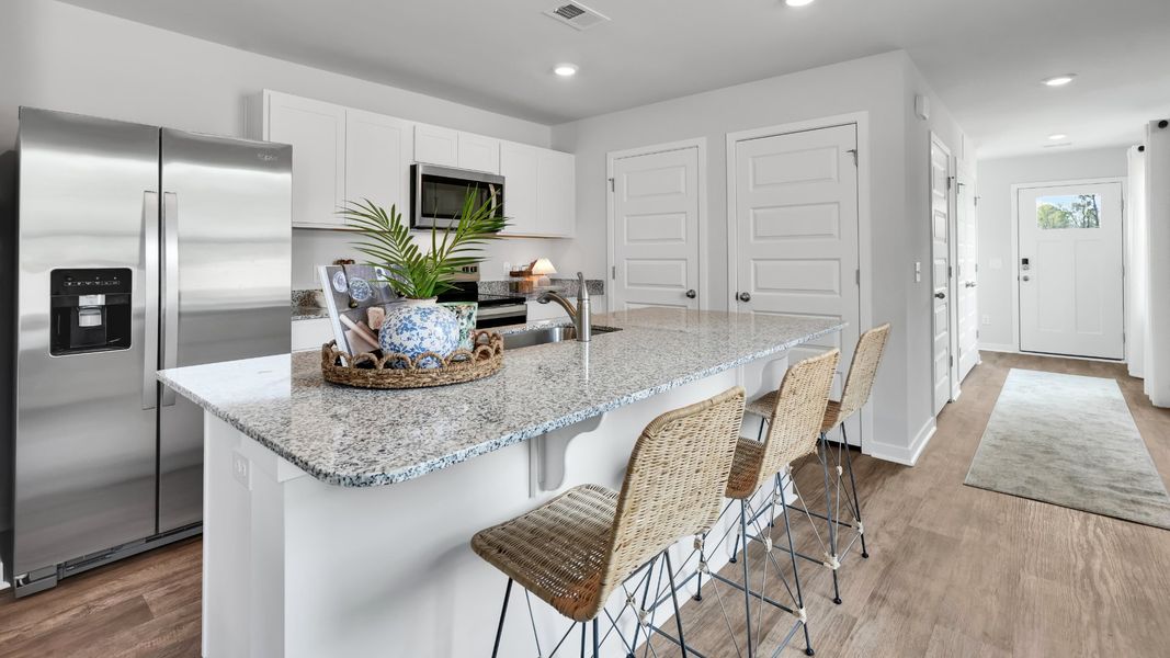 Furnished interior in a model home at Lockwood Landing in Supply (Image 4). Furnished interior in a model home at Lockwood Landing in Supply (Image 4).