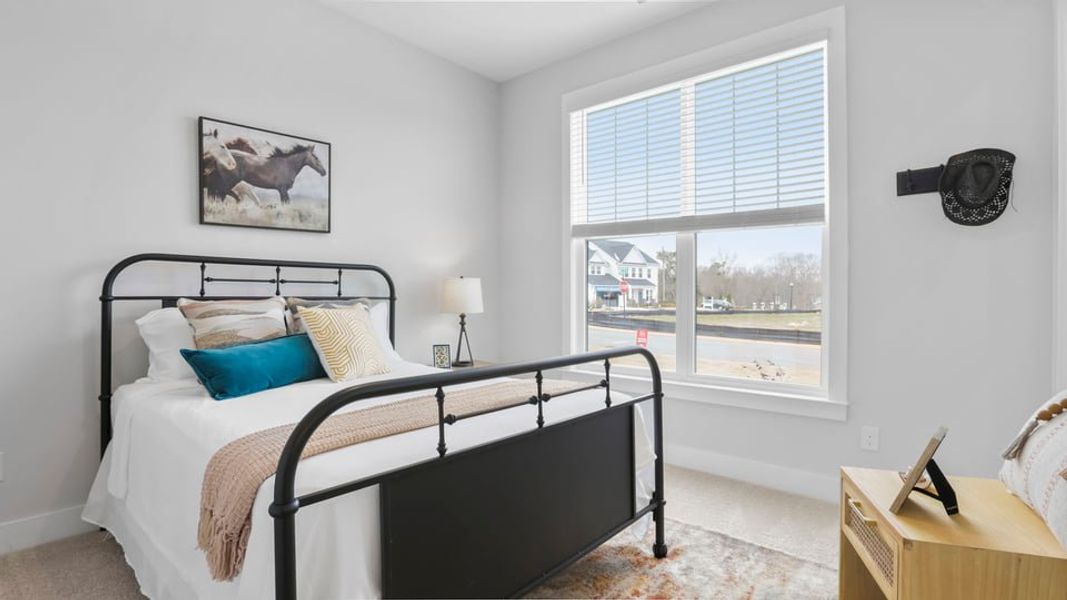 Furnished interior in a model home at Pinebrook in Woodruff (Image 9).