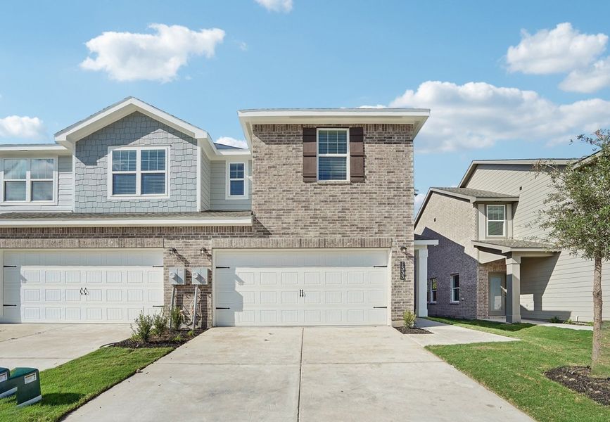 Front exterior of a home in the Broadmoor Village community, located in Cedar Hill, TX (Image 9).