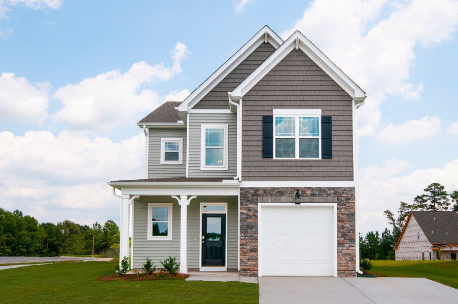 Front exterior of a home in the 78 North community, located in Sanford, NC (Image 2). Front exterior of a home in the 78 North community, located in Sanford, NC (Image 2).