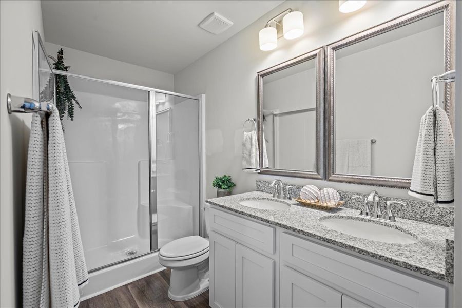 Furnished interior in a model home at Pacific Place in Lyman (Image 19).