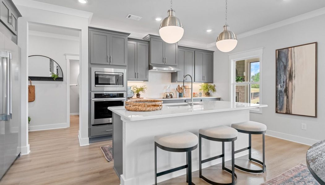 Furnished interior in a model home at Summerlin in Winder (Image 29).