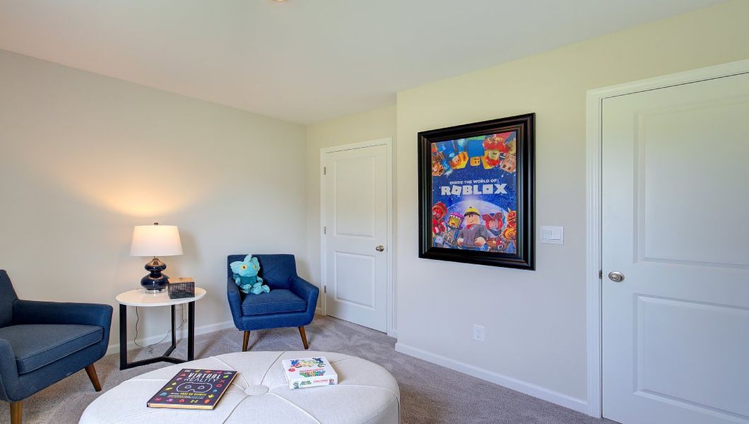 Furnished interior in a model home at Tap Root Farms in Fletcher (Image 32).