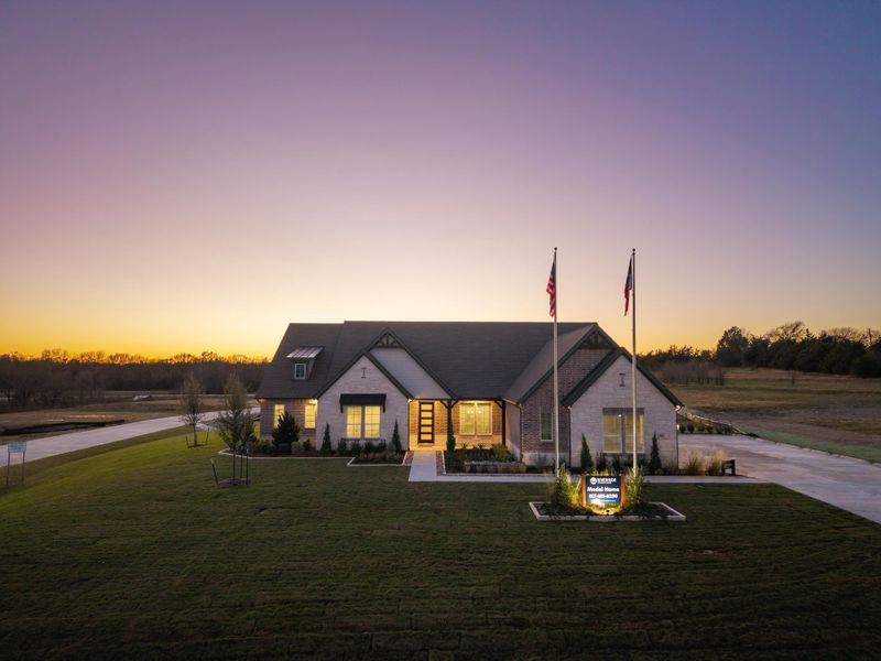 Front exterior of a home in the Grayson Ridge community, located in Van Alstyne, TX (Image 30).