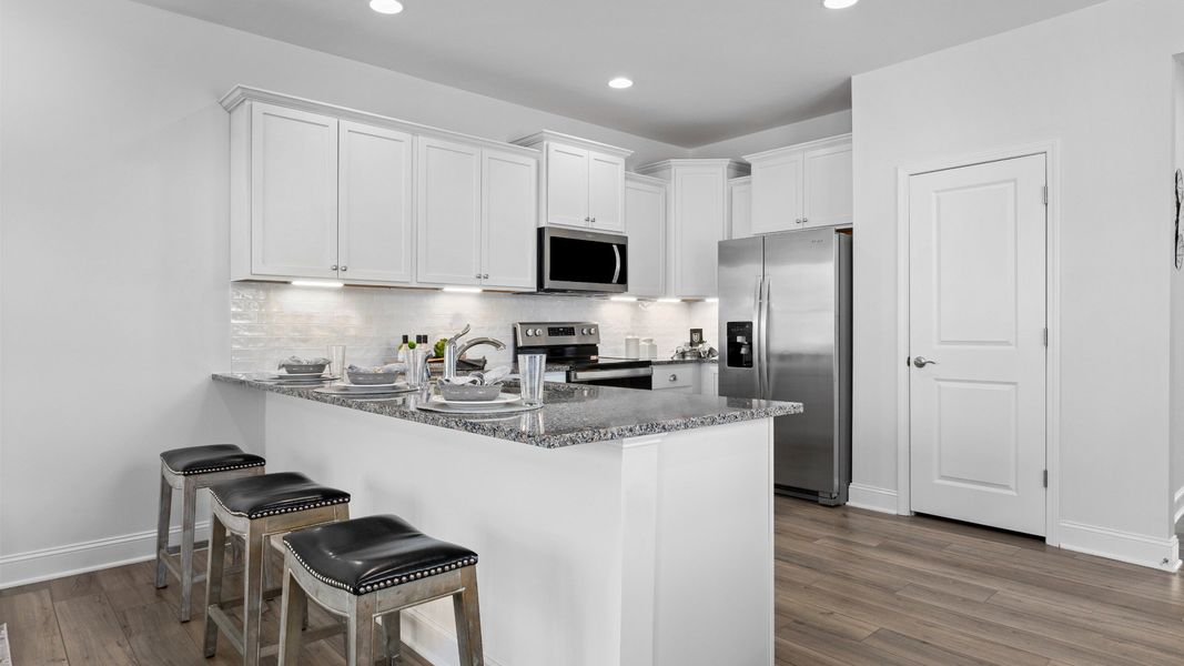 Furnished interior in a model home at Mason Grove in Franklinton (Image 5).