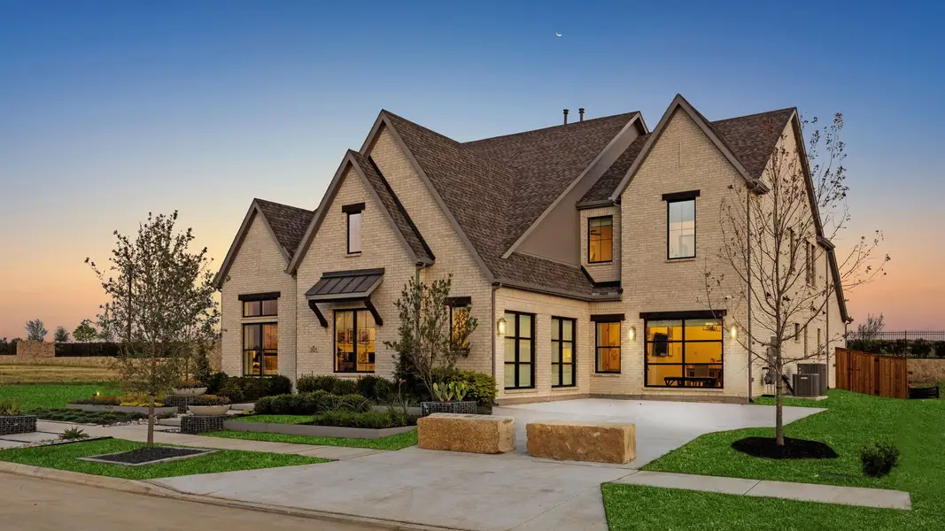 Front exterior of a home in the Windsong Ranch 71' Series community, located in Prosper, TX (Image 6).