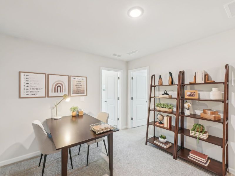 An upstairs loft lends itself for a work or entertainment space. An upstairs loft lends itself for a work or entertainment space.