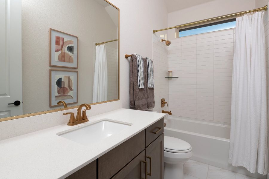 Furnished interior in a model home at Willow Springs in Buda (Image 10).