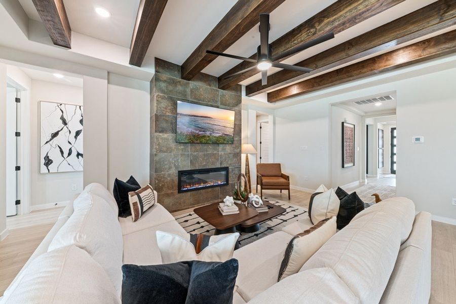 Furnished interior in a model home at The Woodlands in Mico (Image 7).