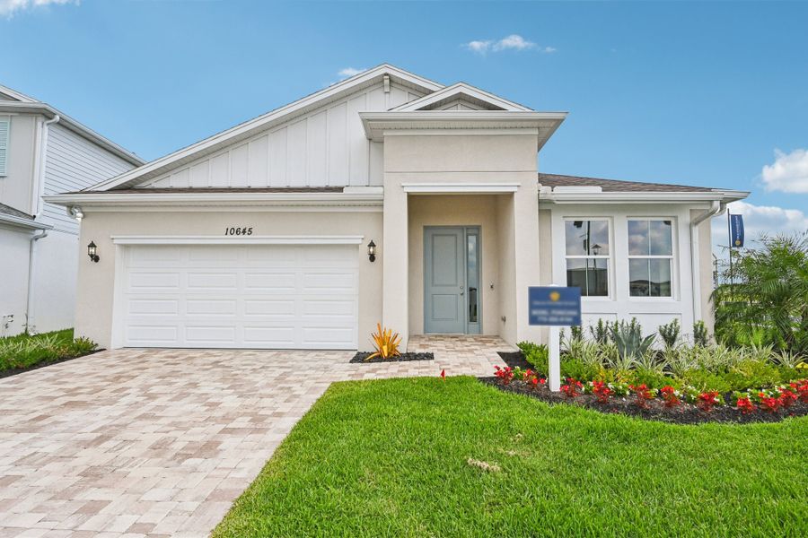 Front exterior of a home in the Brystol North at Wylder community, located in Port St. Lucie, FL (Image 5).