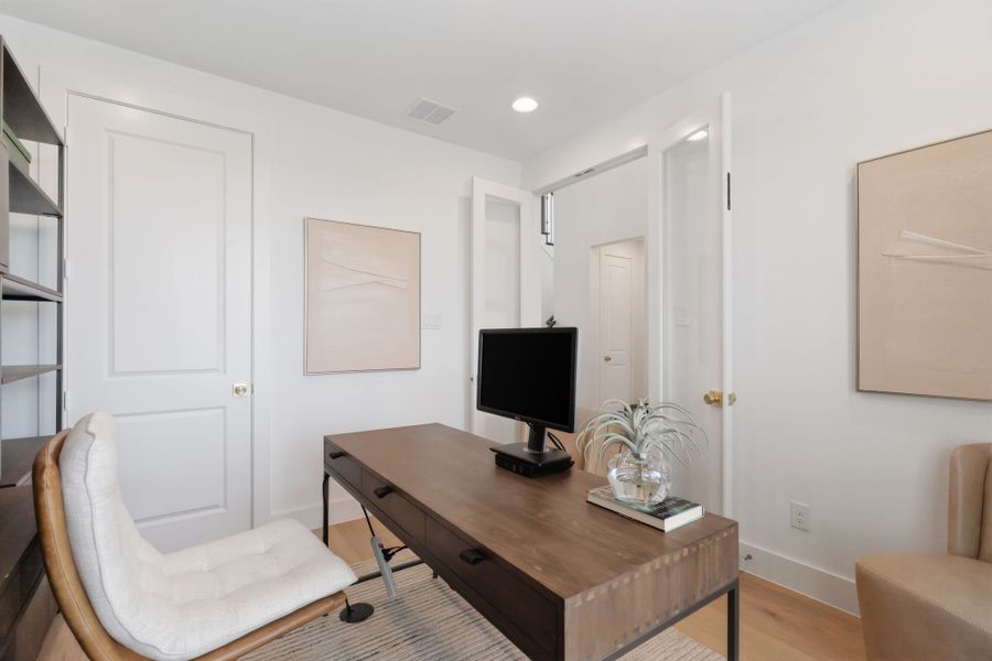Furnished interior in a model home at Sweetgrass 65s in Haslet (Image 33).