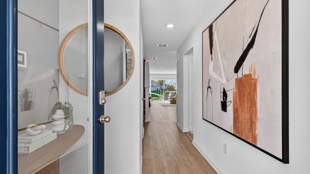 Furnished interior in a model home at Corsair in Middleburg (Image 8).