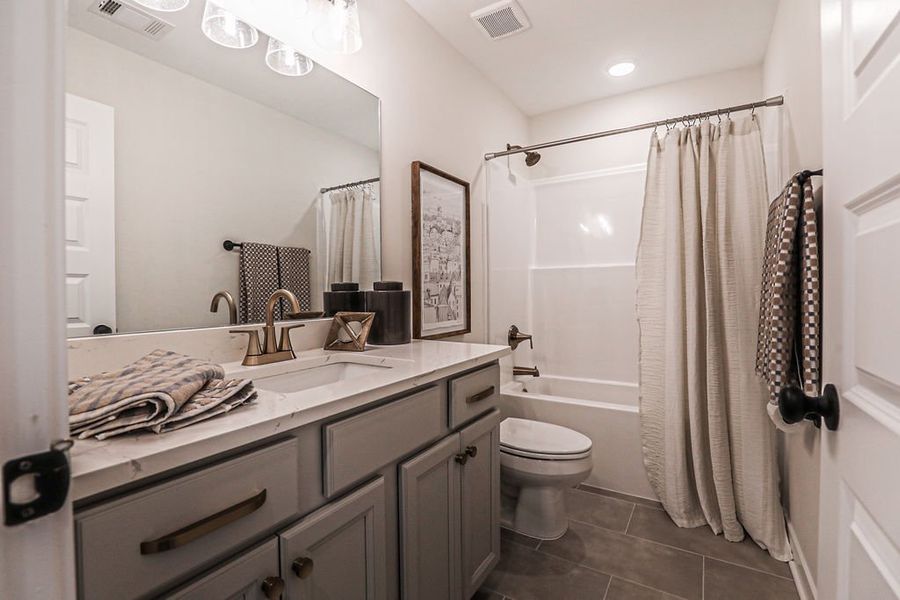 Furnished interior in a model home at Walker Farms in Bartlett (Image 48).
