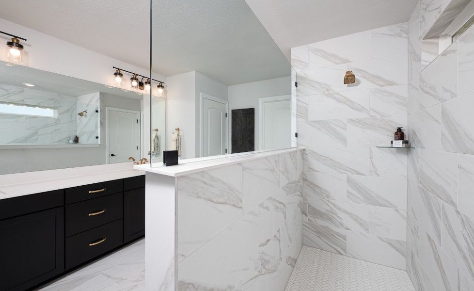 Furnished interior in a model home at Cannon Ranch 45s in Dripping Springs (Image 11).