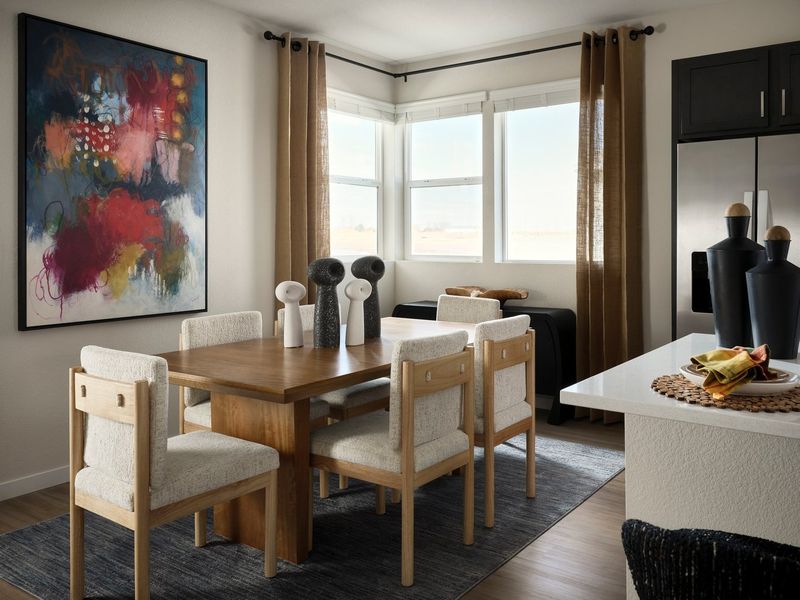 Furnished interior in a model home at Novella at Barefoot in Firestone (Image 3).