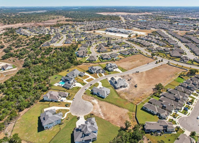 Aerial view of the Santa Rita Ranch – Estate Homes community in Liberty Hill, TX, showing layout and nearby surroundings (Image 6). Aerial view of the Santa Rita Ranch – Estate Homes community in Liberty Hill, TX, showing layout and nearby surroundings (Image 6).