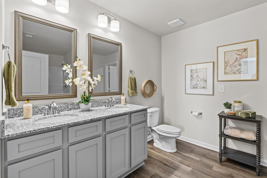 Furnished interior in a model home at Canary Woods in Hopkins (Image 16).