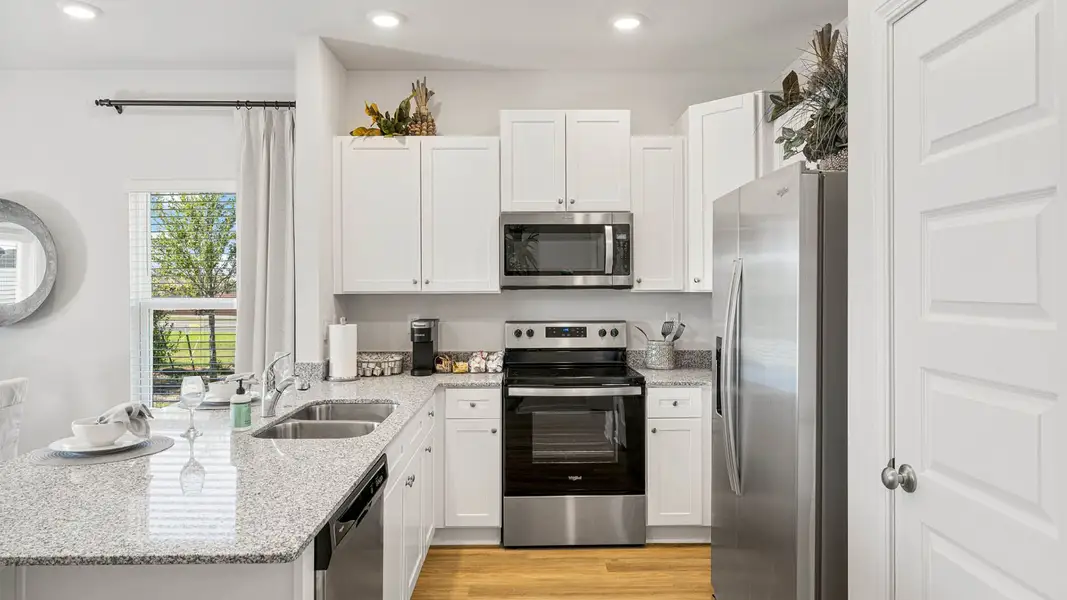 Furnished interior in a model home at Jake's Landing in Lynn Haven (Image 17). Furnished interior in a model home at Jake's Landing in Lynn Haven (Image 17).